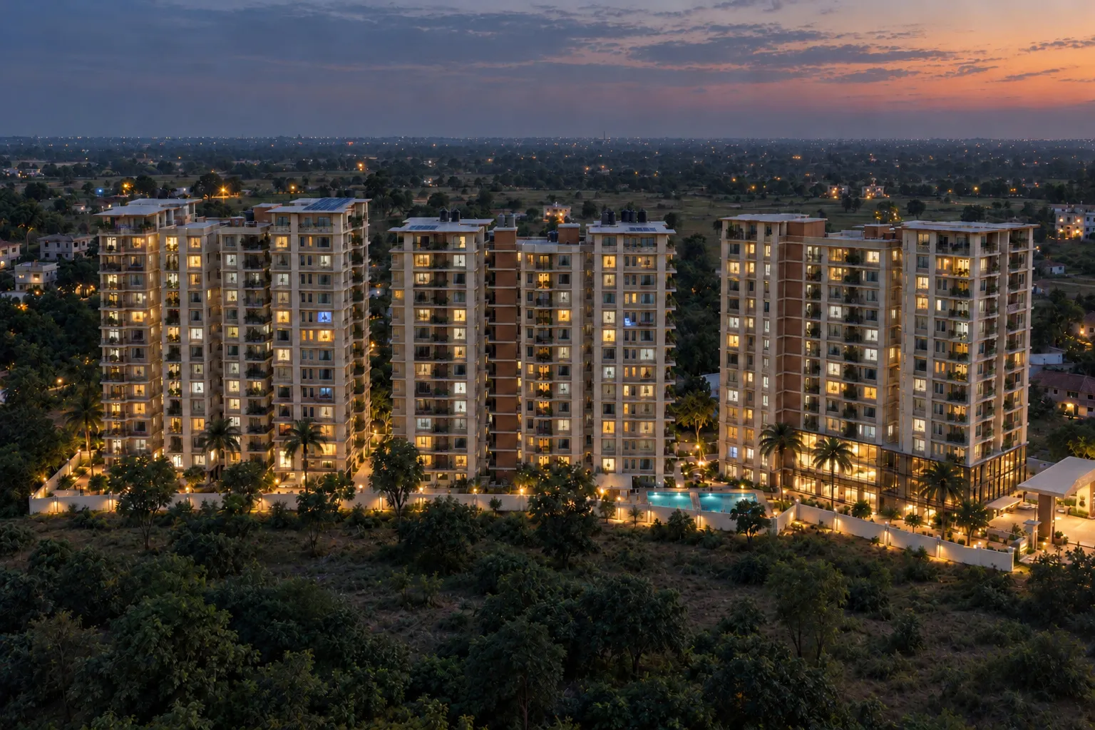 The towers at dusk, the first windows lit